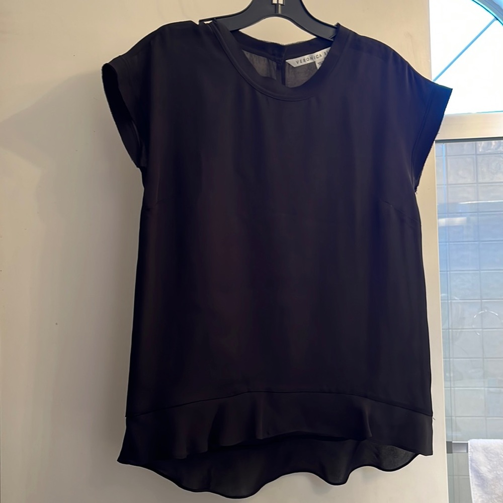 Soft, but has little stretchy material in it.